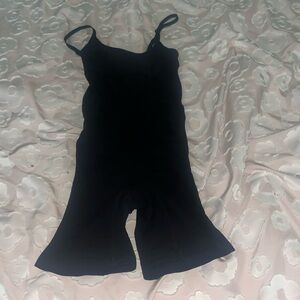 Bodysuit snatches your waist a bit and the lower stomach.